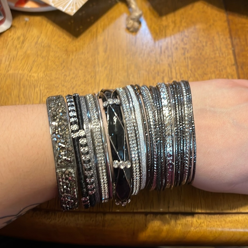 Black, silver, dark gray bangle bracelets. Never used